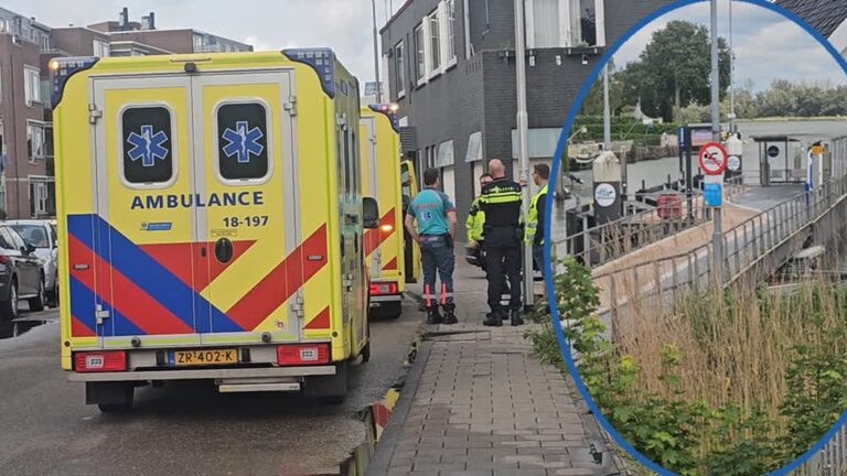 Vrouw valt in het water en wordt gered door omstanders